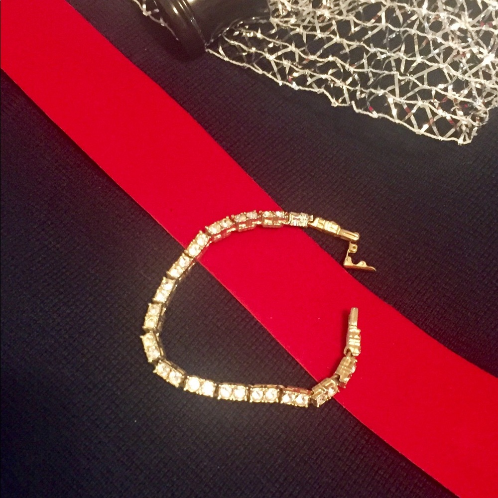 14k gold plated bracelet with rhinestones.